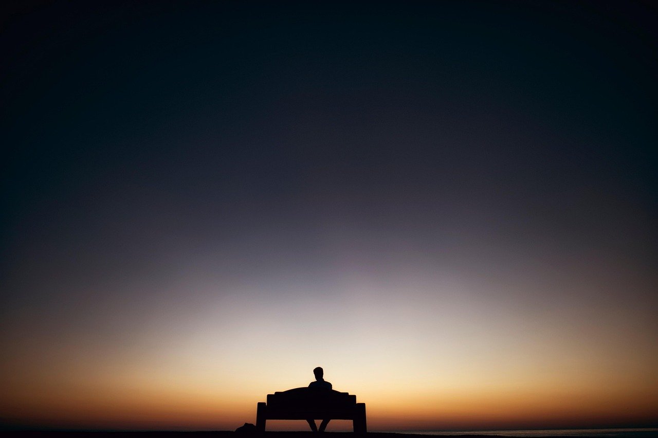 man, bench, sunset, silhouette, alone, lonely, solitude, solitary, dark, dawn, dusk, outdoors, sit, sitting, seat, sky, nature, twilight, skyscape